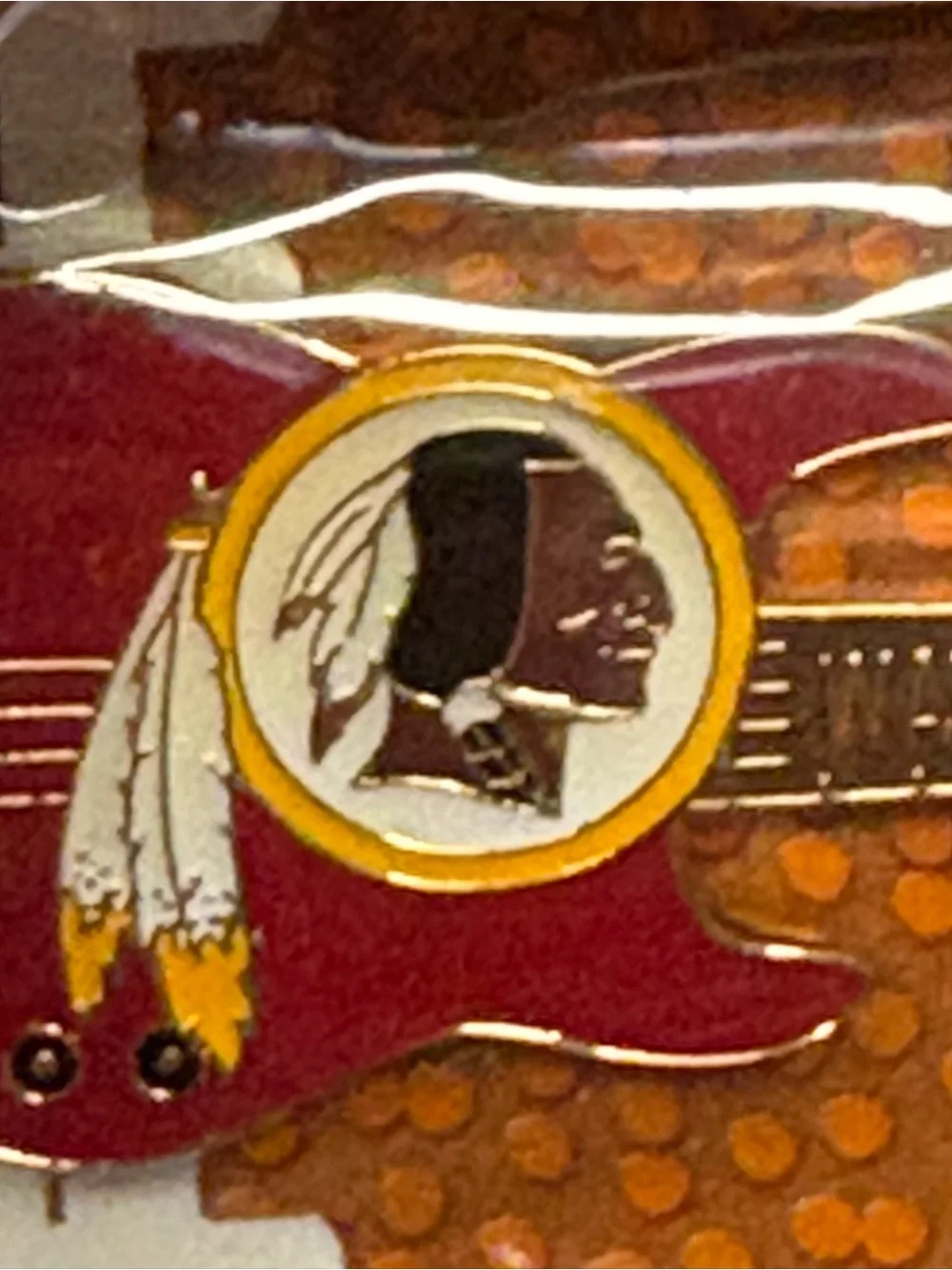 Vintage Washington Redskins guitar shaped lapel pin by Aminco. New old stock